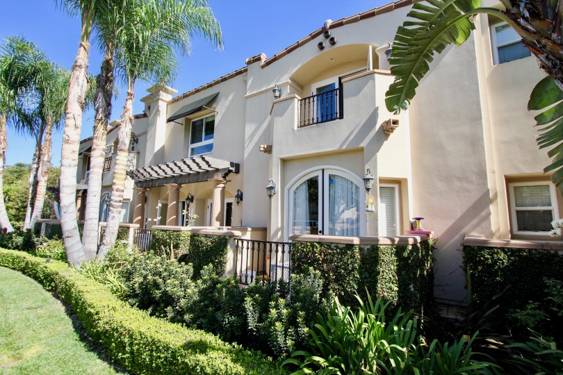 The hedges around the Villas at Kentwood building