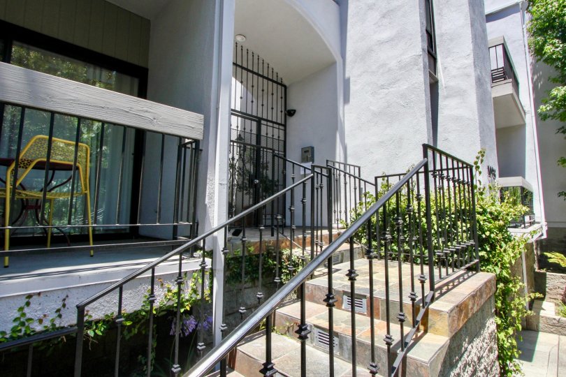 balcony and entrance stairway, gated entry of Westwood Center Townhomes