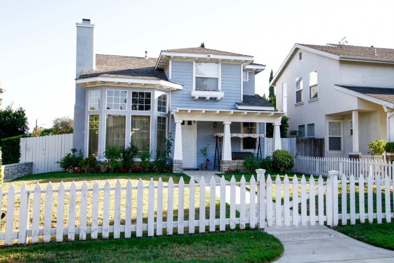 The sidewalk leading up to Canoga Park Picket Fences