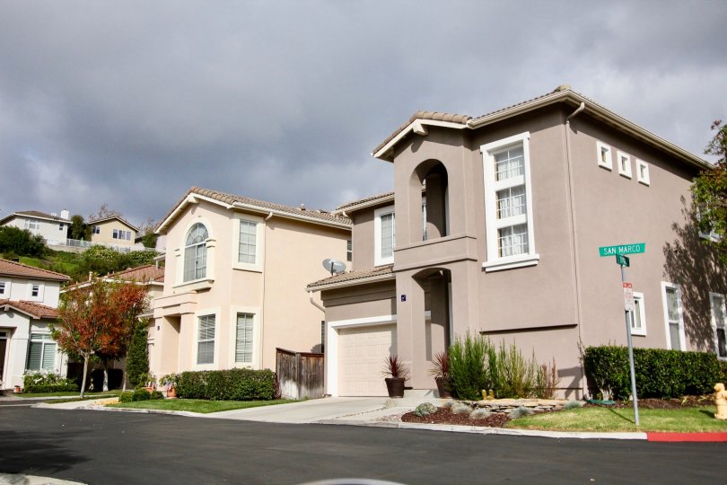 Various exterior home colors are visible throughout the community