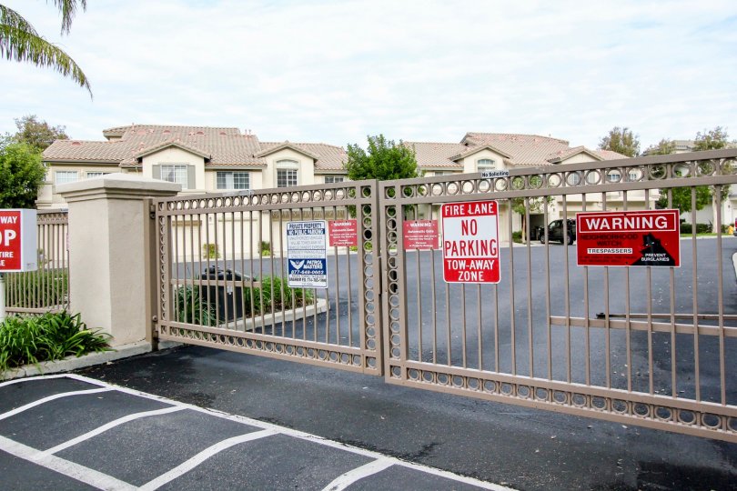A sunny day in the community of Viewpointe North with a view of their security gate