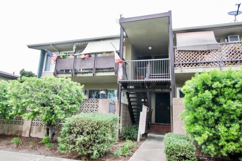 A two-storey housing in the Anaheim Village I community with eclectic elements.