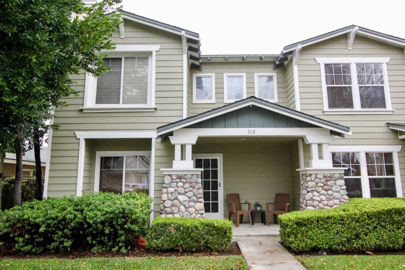 The view from the sidewalk in front of a beautiful home in the Heritage Place Bungalows of Anaheim, California.