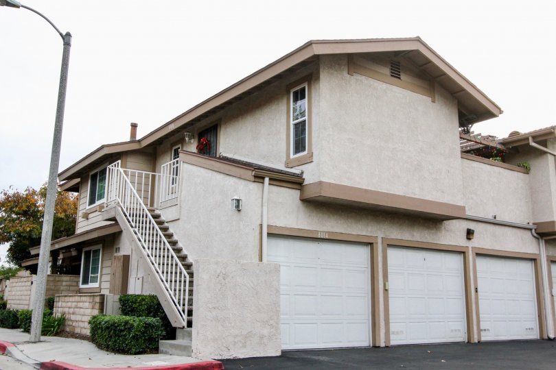 Condo home with three garages inside Village Park at Buena Park CA