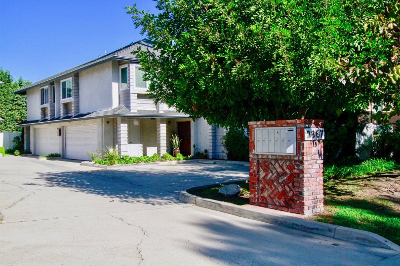 The houses in the Pelican Point is the fully residential area with nearby houses and also with EB Board with tres and plants.