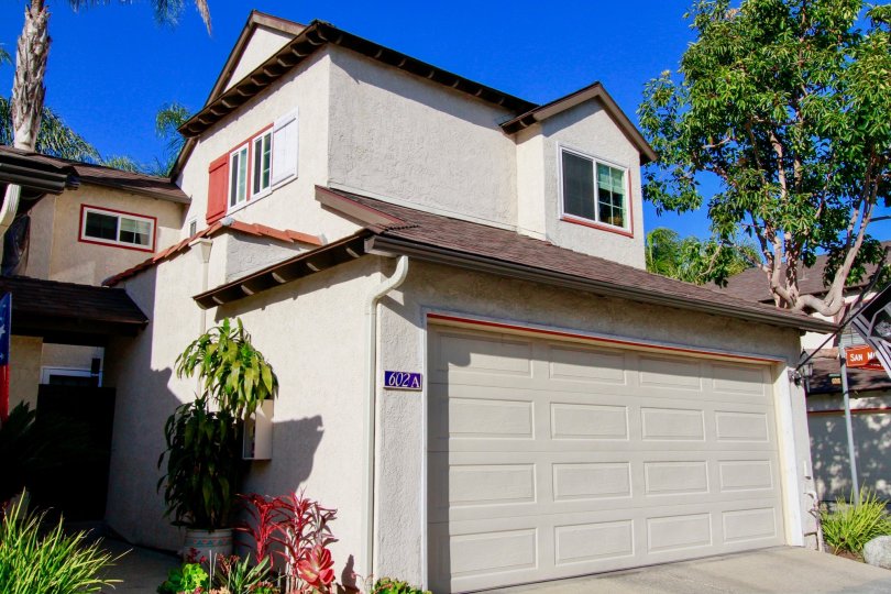 A sunny day in Costa Mesa City in California with it's nice view of the house garage.
