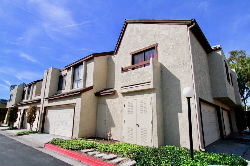 Beautiful blue sky under Embass Park Townhomes in Cypress, CA