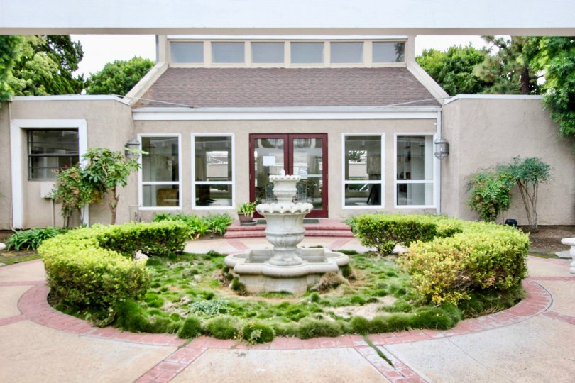 The Arbor Fullerton California chocolate folding design of house and round shape foundation in front