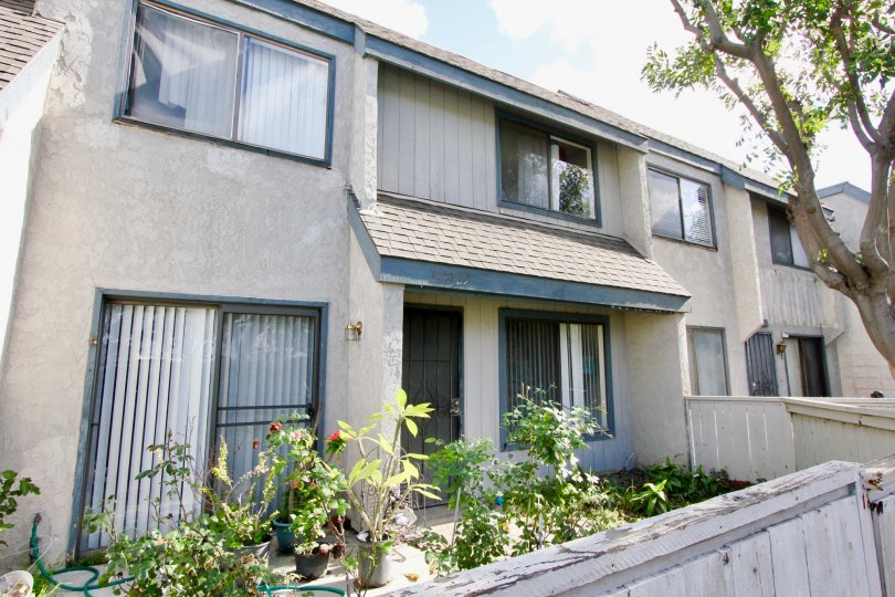 THE HOUSE IN THE LIVINGSTON MEADOWS WITH THE FLOWER PLANTS, TREES