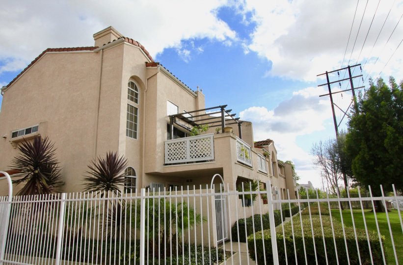 Yorkshire Townhomes Building with green Park at Garden Grove