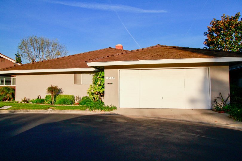 Fernhill Huntington Beach California hut shaped mild color slanting roof in blue sky day