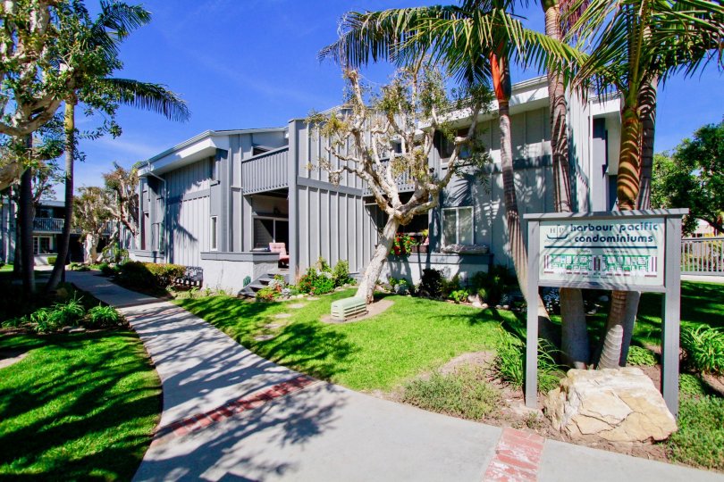 Harboring Villas Huntington Beach California grey painted grant look home with sign board