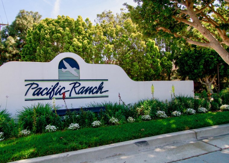 Extraordinary view of trees and name board in Pacific Ranch Villas of Huntington Beach