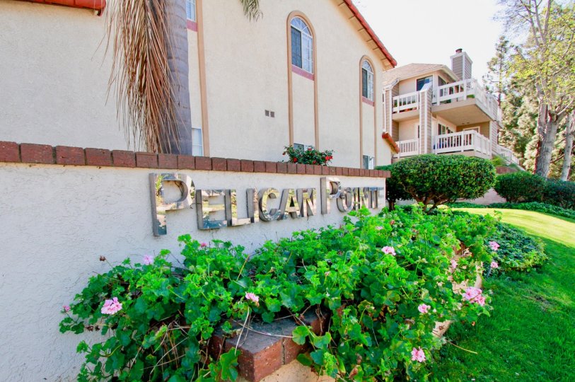 Excellent garden view with Name Board near villas in Pelican Pointe Villas of Huntington Beach