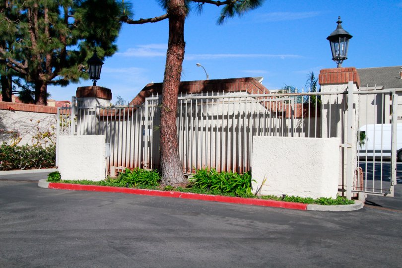 Pointe Surfside Huntington Beach California building fully cover the compount gate not view for the house light attached in the gate