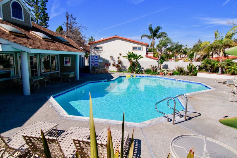 Marvellous looking swimming pool at centre with sitting near villas in Pointe Surfside of Huntington Beach