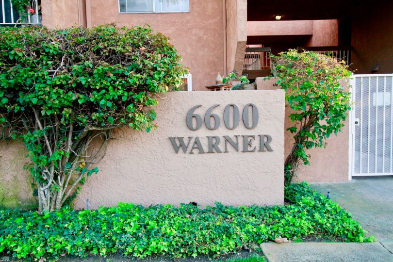 Street number for the Villa Warner community with a gate.