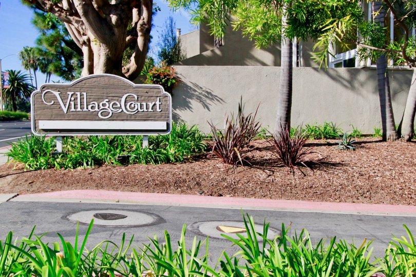 THE VILLAGE COURT THE ENTRANCE IS AWESOME LOOKING GREENY IN HUNTINGTON BEACH IN CALIFORNIA