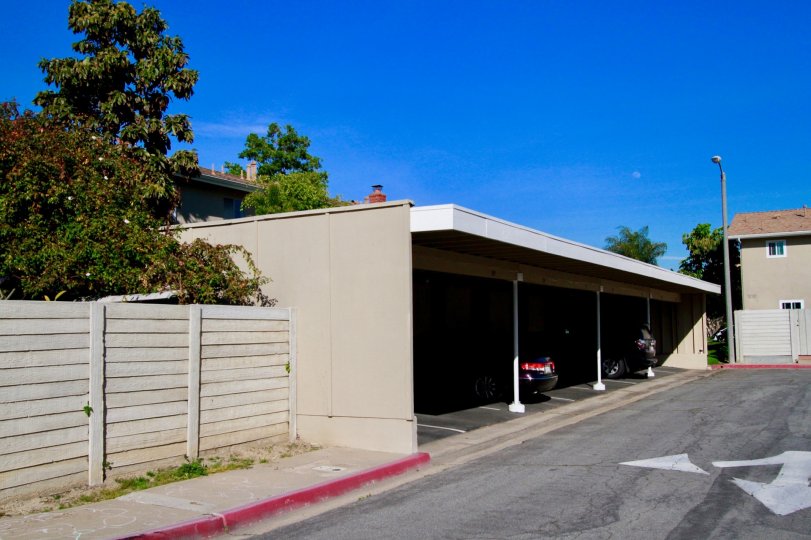 the open parking lot is also in village townhomes of huntington beach, california which is used to park the two wheeler and car and cycle also