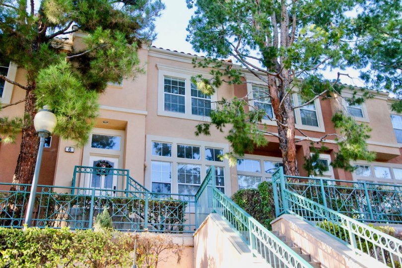 A house with massiev entrance with many steps in corte bella irvine california