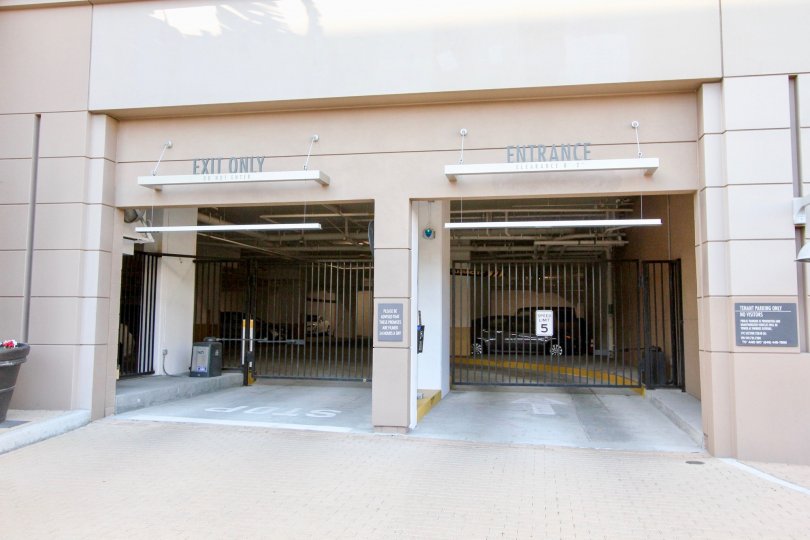 A parking entrance and exit access in the Plaza Irvine community.