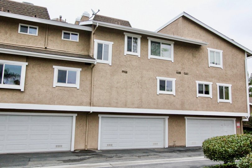 Villa in Coyote Creek has car parking facilities and dish antenna on terrace roff