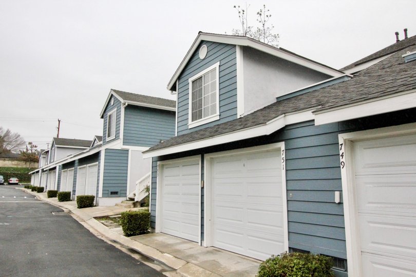 THE 751, 749 FLATS IN THE STONE HARBOR WITH THE SHUTTERS, PLANTS