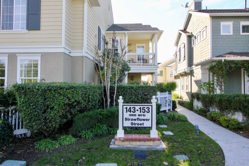 A sign board is placed in a residential area at Charleston Place.