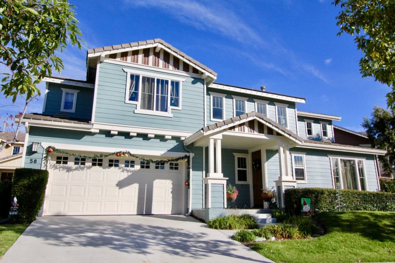 Nice trees with blue sky and lawn near villa of Potters Bend of Ladera Ranch