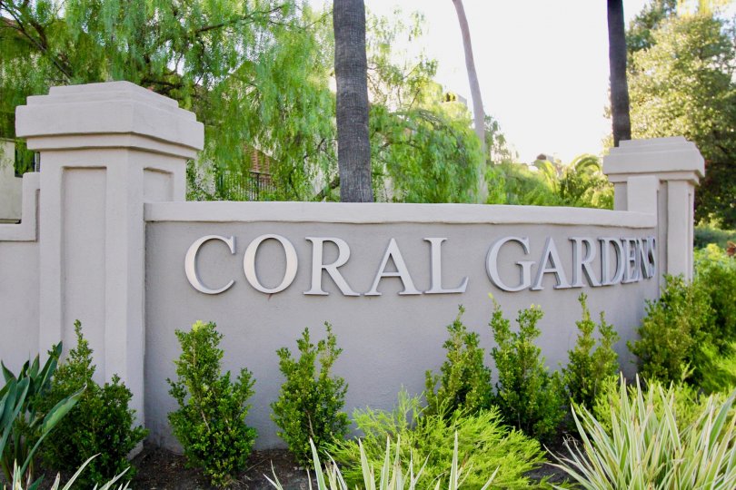 Grey color compound wall with Coral Gardens name in Coral Gardens.