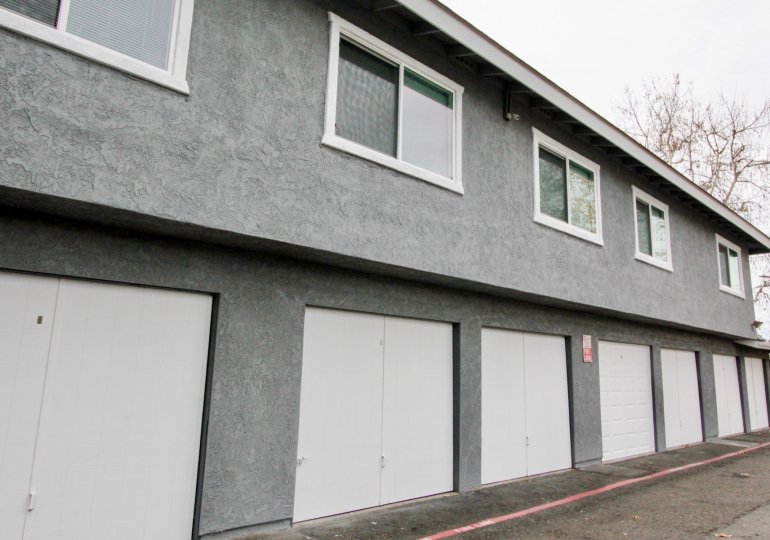 A garage outside the Stonybrook Villas community on a long gray building