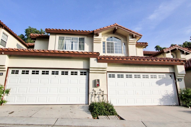 A big white and brown, to story house in the Rancho Santa Margarita neighborhood.