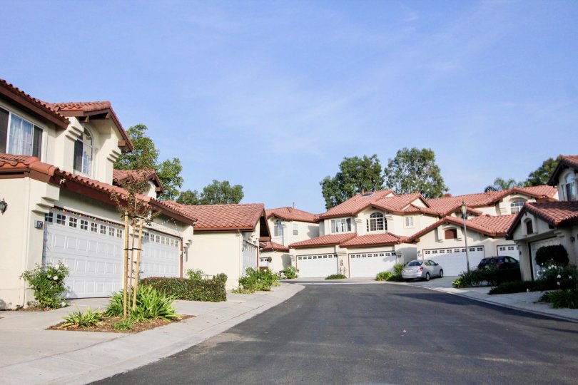 Multi family housing with tiled roofs and garages in the community of Candelero in Rancho Santa Margarita, California
