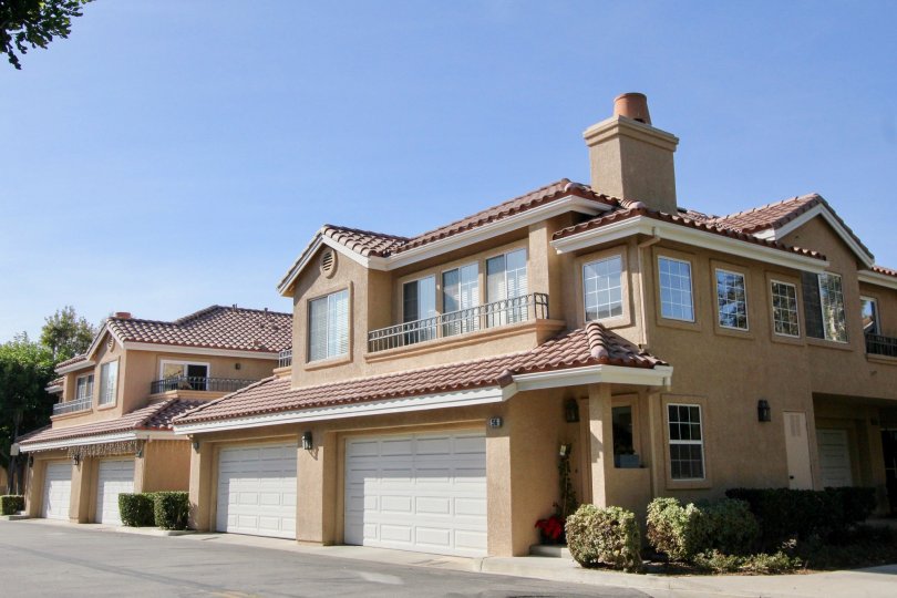 Tiled roof multi family housing with nice balconies in the Sonoma Court community of Rancho Santa Margarita, California