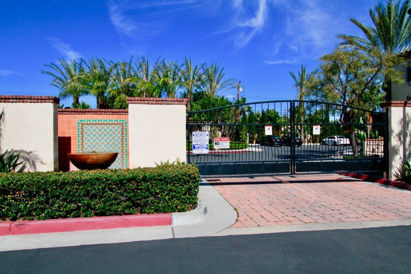 A view of the entrance gate to Avenue E community in Santa Ana city