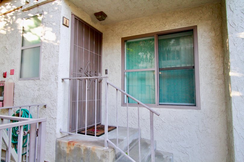 building in front of the garge in North Broadway Townhomes