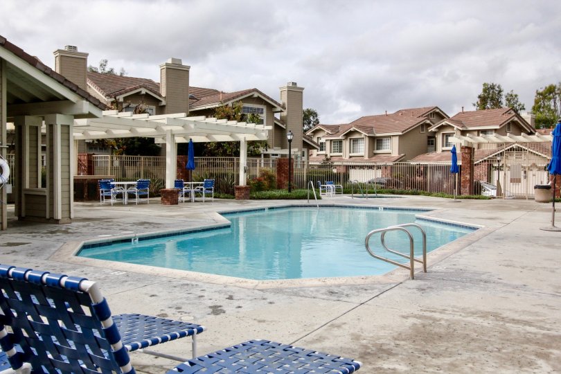 Fabulous swimming pool with sitting between villas of Sycamore Glen Tustin