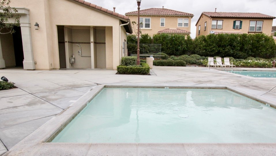 Villaggio Yorba Linda California having square shaped swimming pool and lights