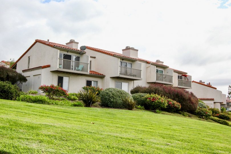 View of the second floor balconies on a hillside at Alta Mira II in Carlsbad, California