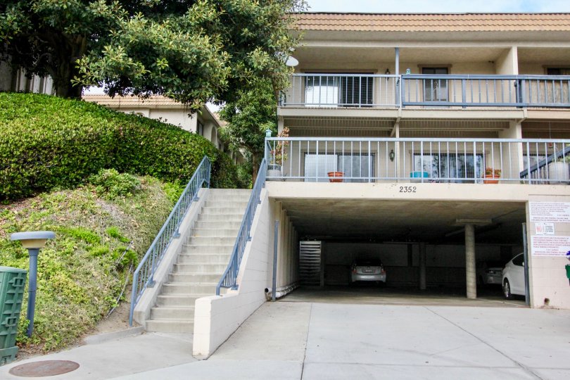 An apartment building with lower level garage in Casa Grande in Carlsbad, California.