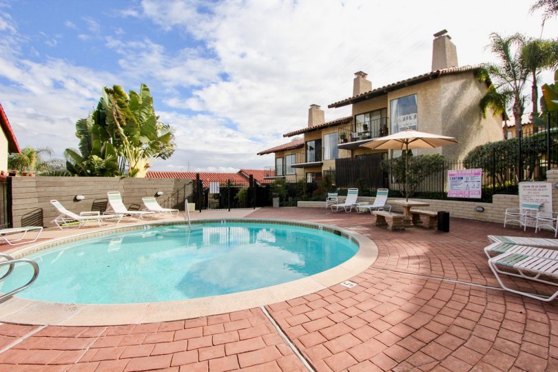 A scene by the pool at the Casitas De La Costa apartments in Carlsbad, California
