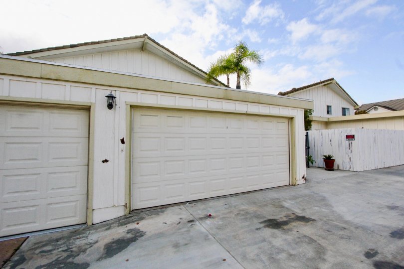 Cloudy sky with garages in the EL Oasis Community in Carlsbad, CA.