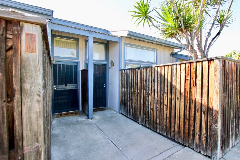 Security screen doors with high privacy wooden fences at Casa Vianney