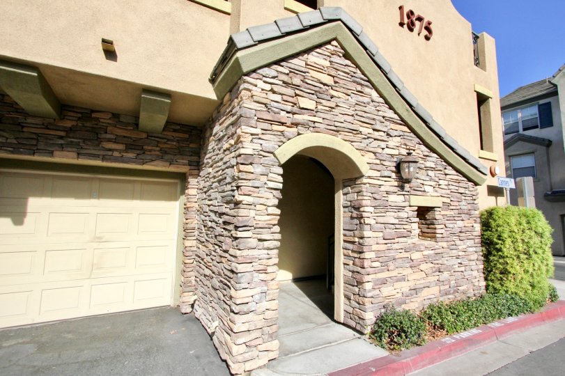 Arched stone doorway located at Mer Soleil community in Chula Vista CA