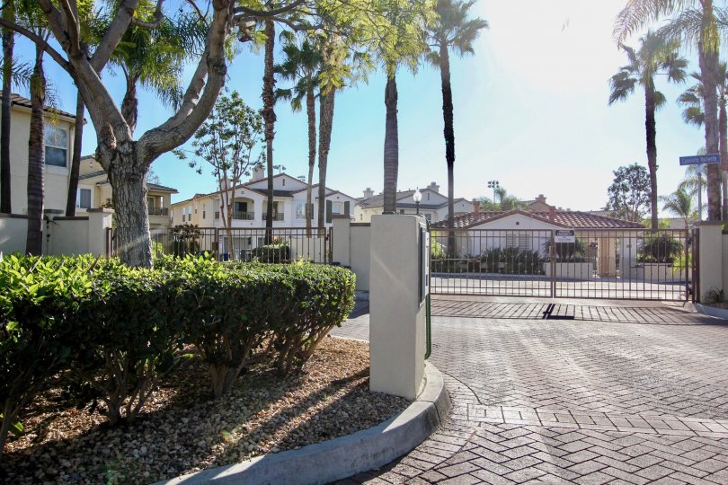 Entrance gate with tiles and garden in Tivoli Villas.