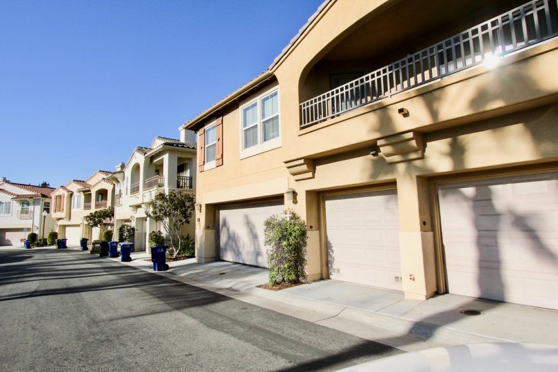Garbage day outside the garages of Tivoli Villas in Chula Vista, California