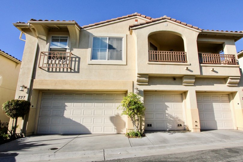 A sunny day in the area of Tivoli Villas, trees, outside, garage, patio, light, condo