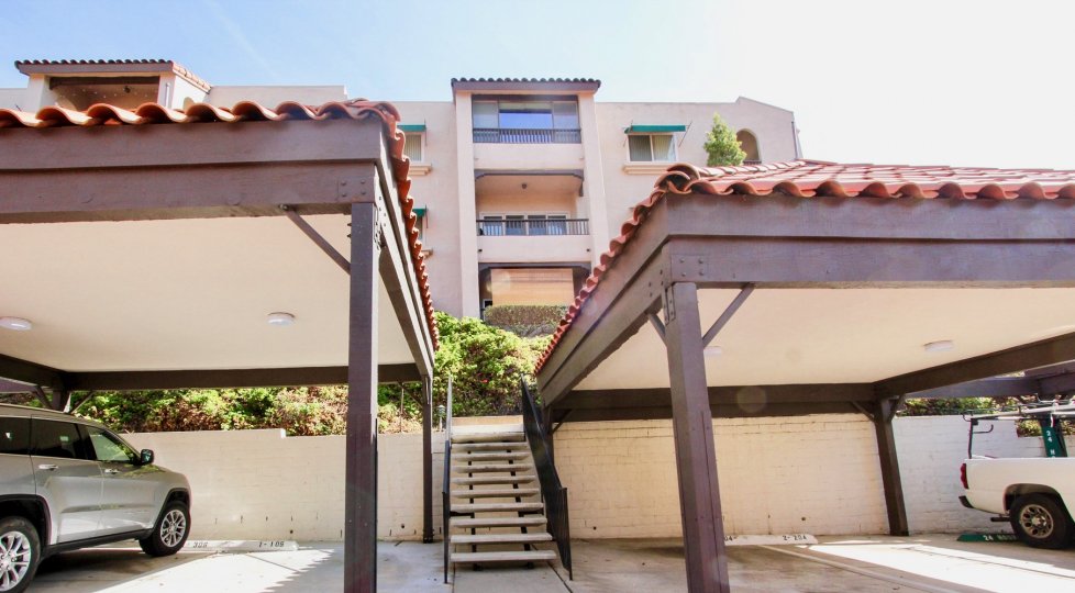 Parking area with stairway beneath residential buildings at Costa Viva in Clairemont Mesa California