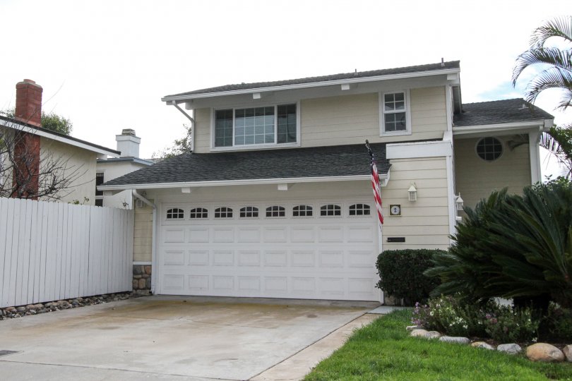 A house with a garage and American flag in Coronado