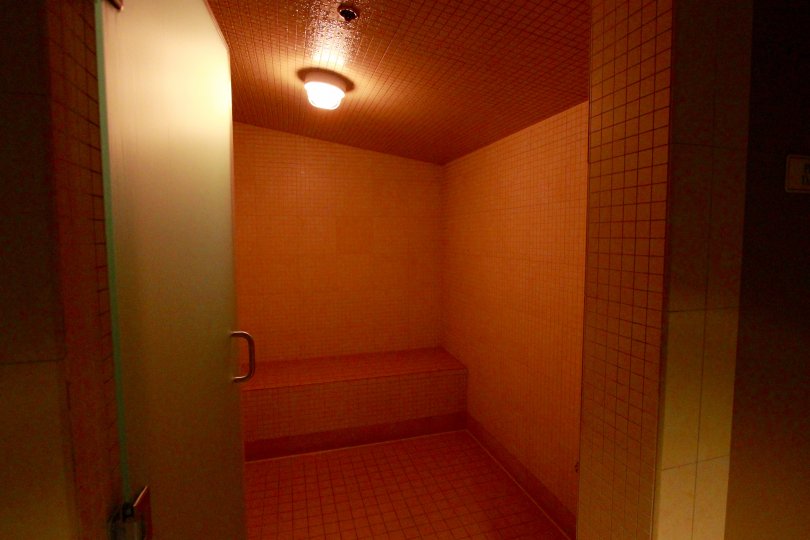 bathroom, sauna, tiles, heat lamp, bench, door, green